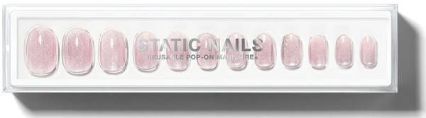 Static Nails Velvet Nails Pink Round Reusable Pop-On Manicure set with pale pink shimmer press-on nails arranged by size in a clear case.
